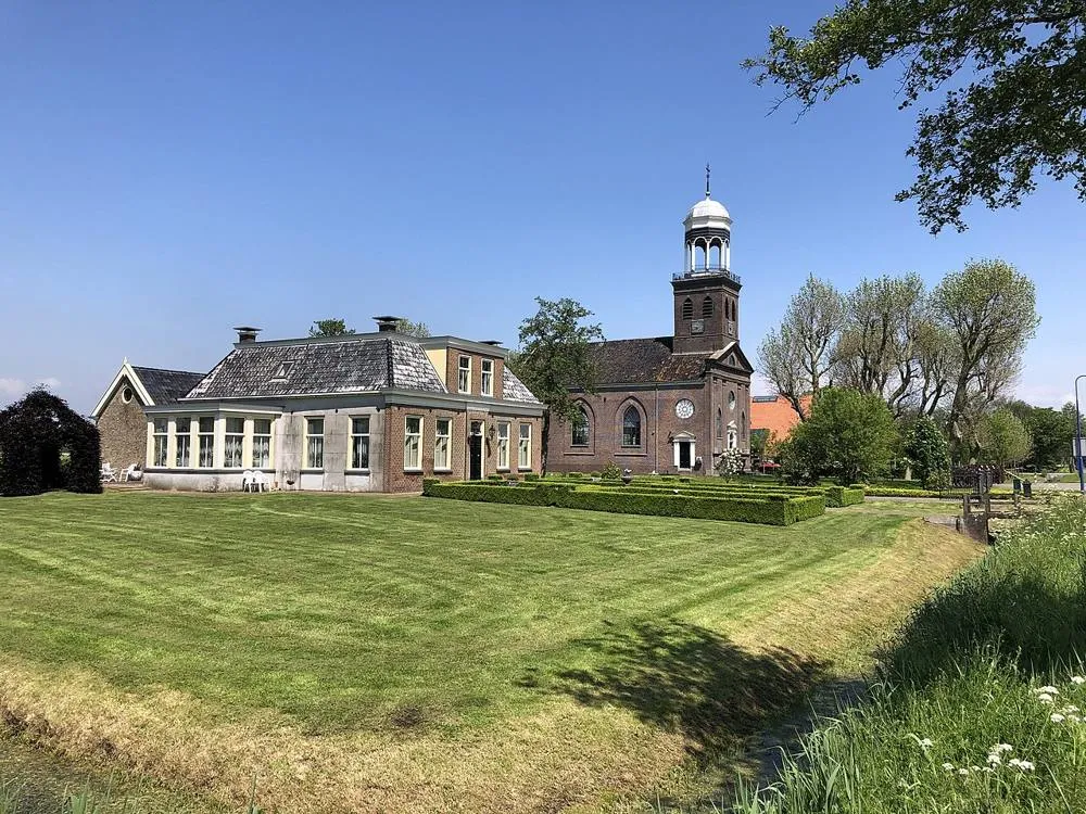 Oosterzee: Netherlands, Oosterzee, house at Buren 27 and Martinus church
